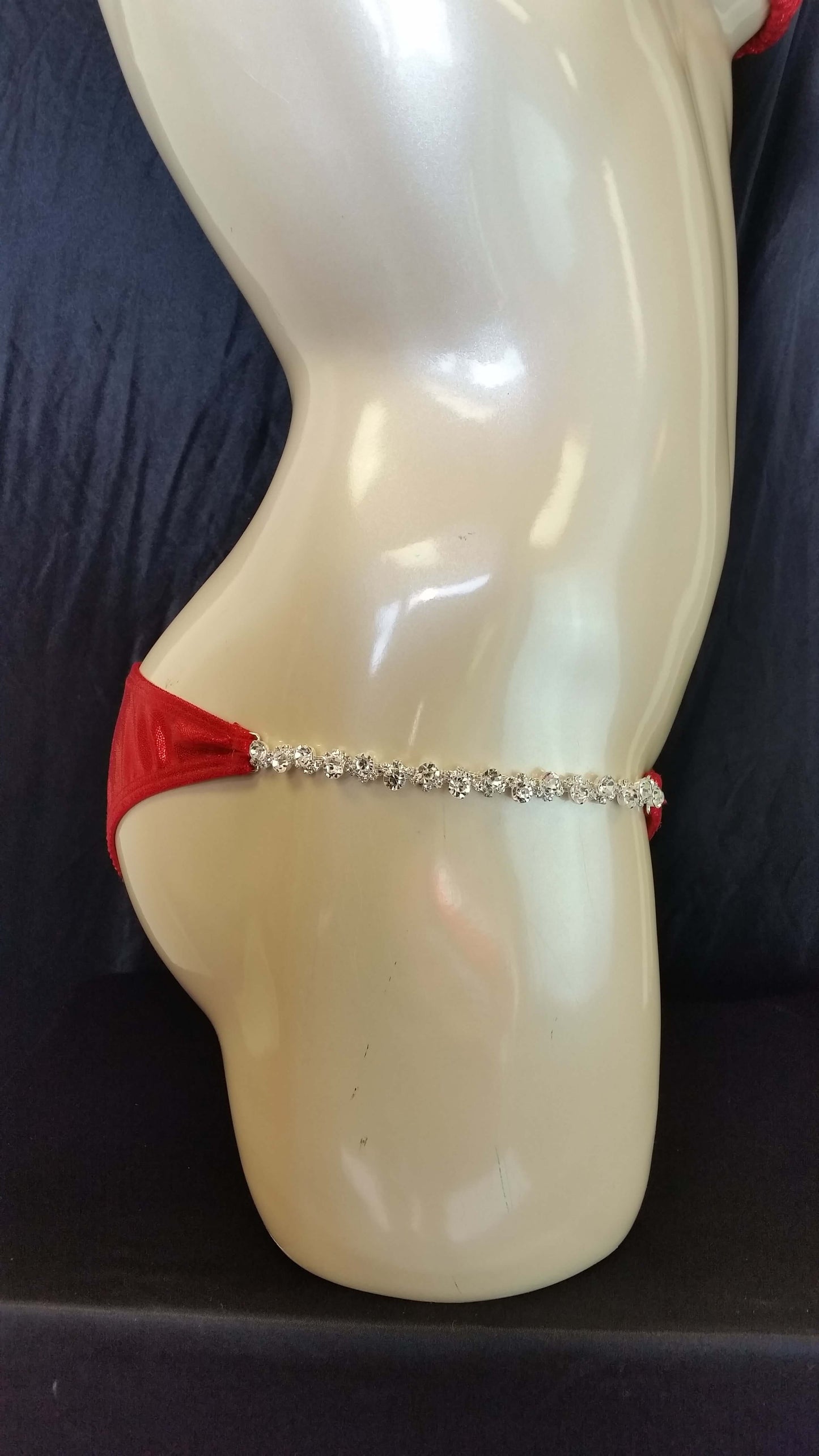 Red bikini with ruby colored rhinestones in a linear pattern design