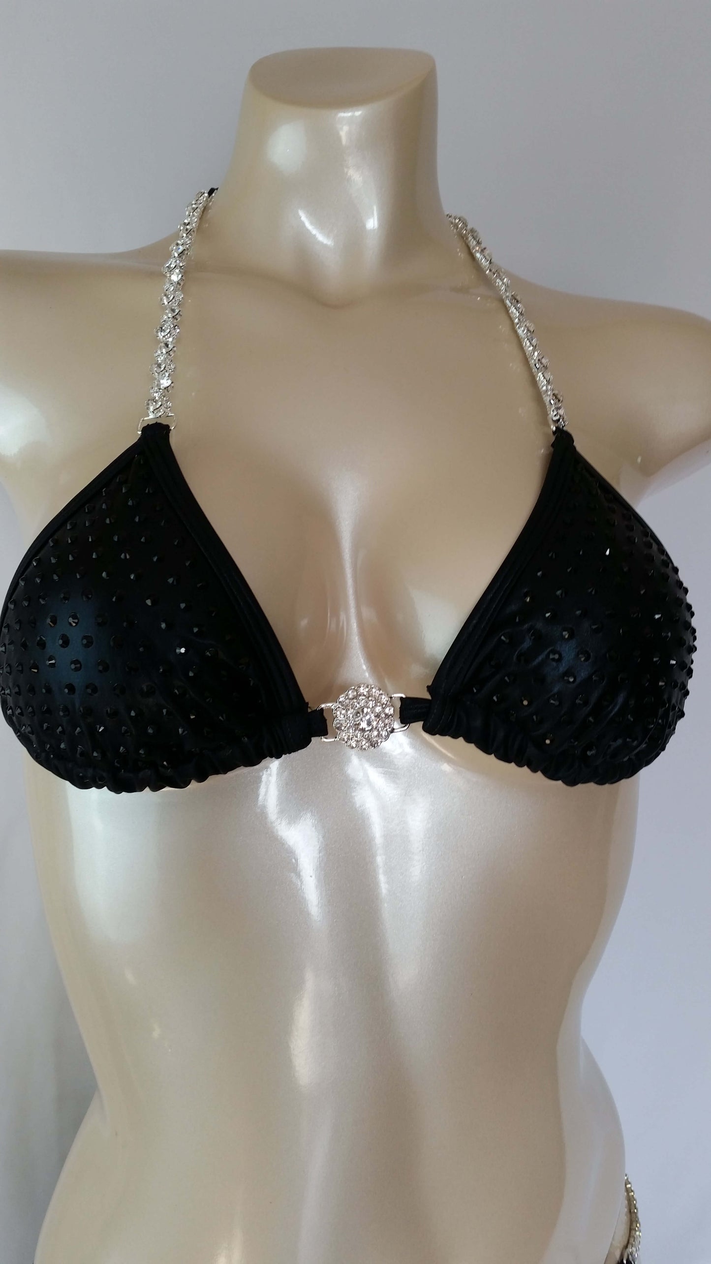 Black leather bikini with black rhinestone in a linear pattern design