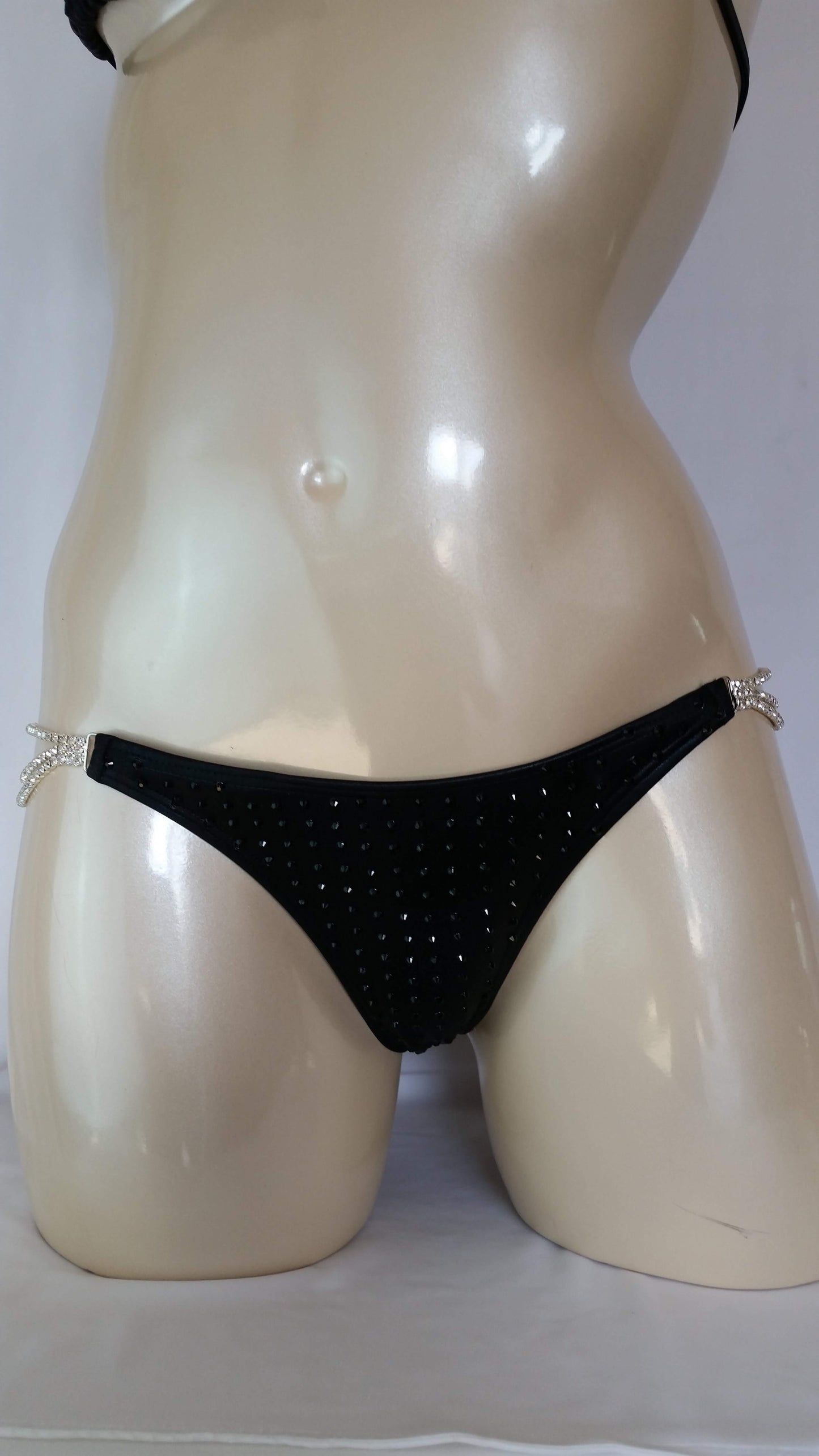 Black leather bikini with black rhinestone in a linear pattern design