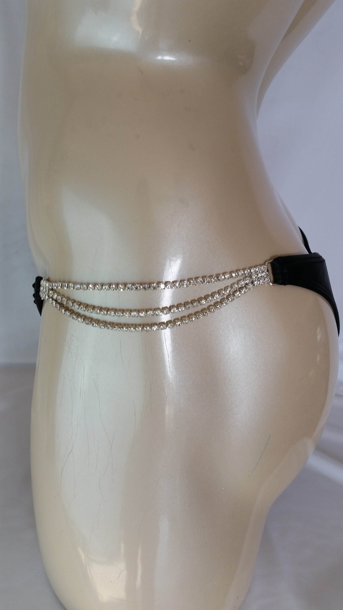 Black leather bikini with black rhinestone in a linear pattern design