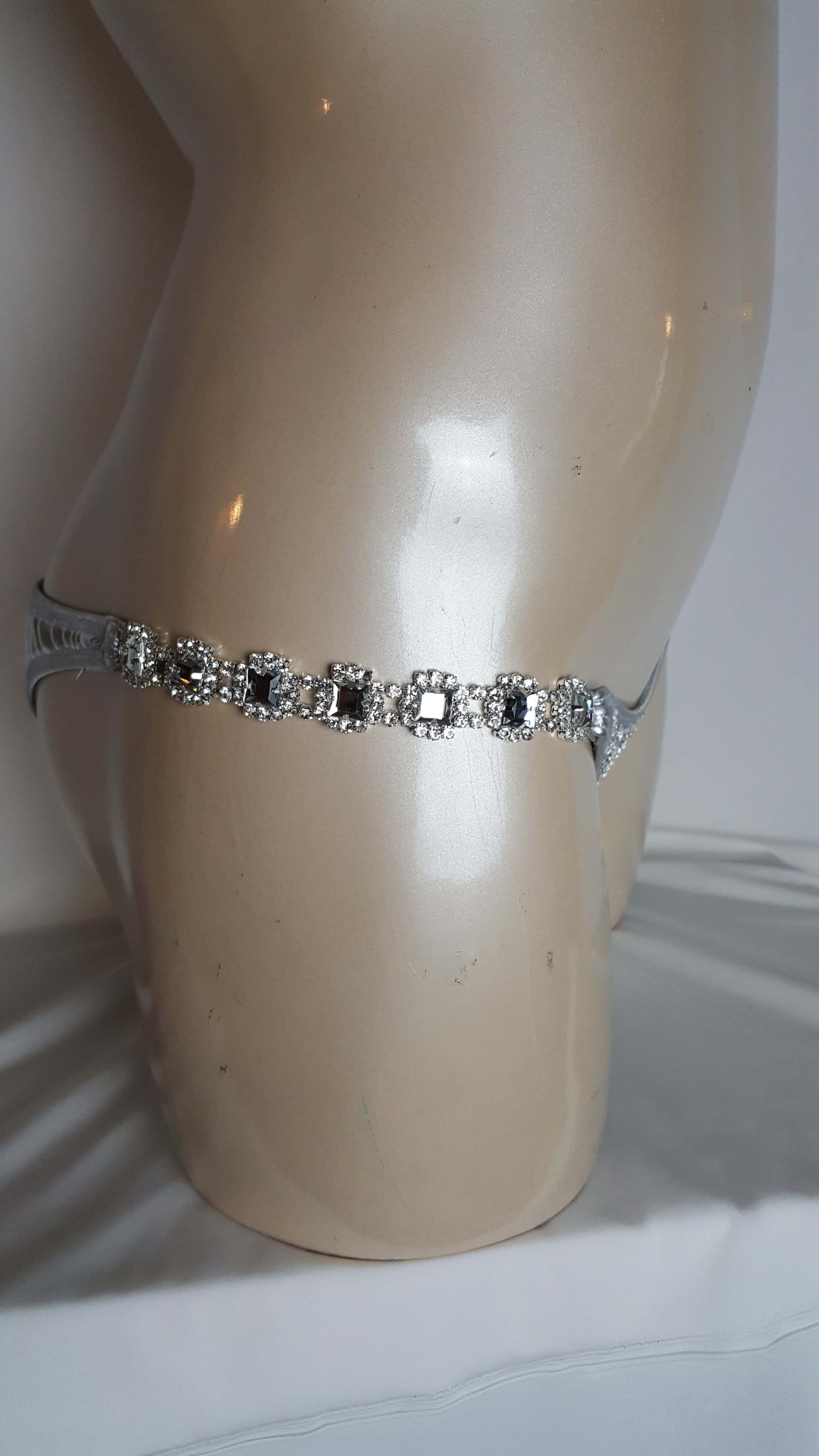 Silver bikini with cascading diamond mirror rhinestones.