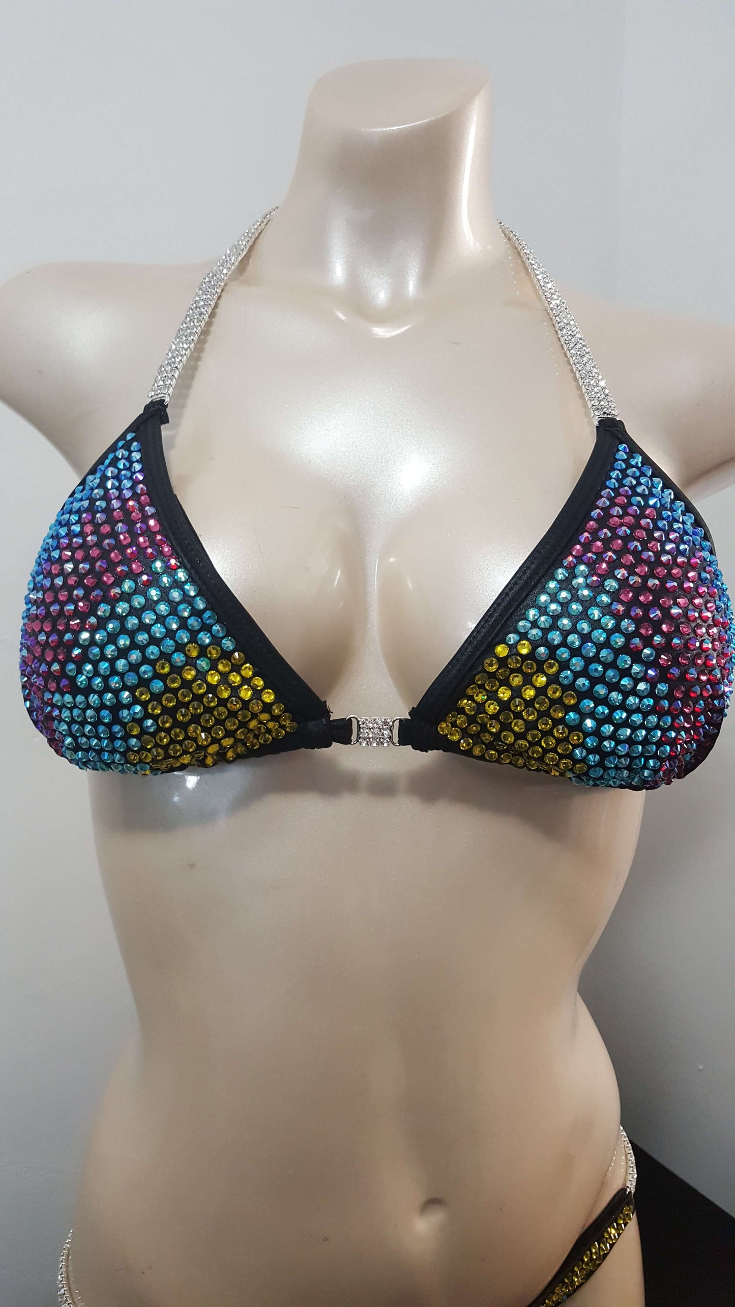 Black bikini with rainbow colored rhinestones design.