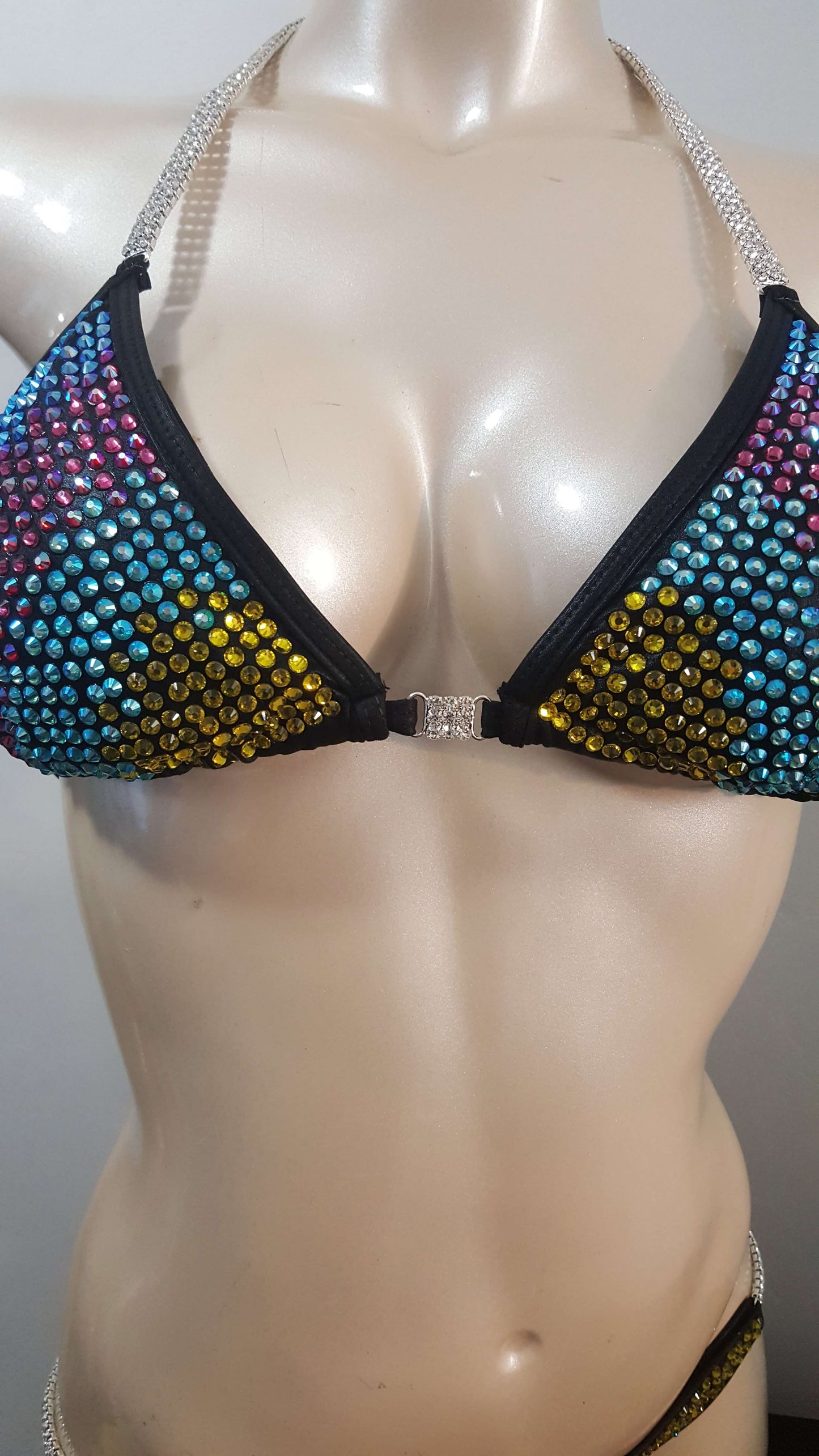 Black bikini with rainbow colored rhinestones design.