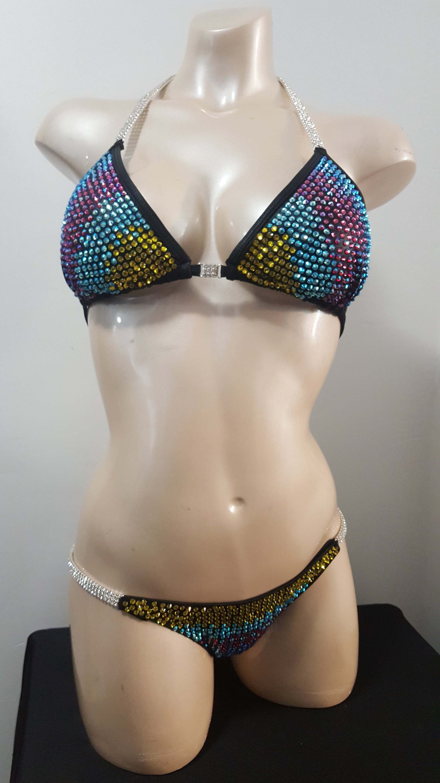 Black bikini with rainbow colored rhinestones design.