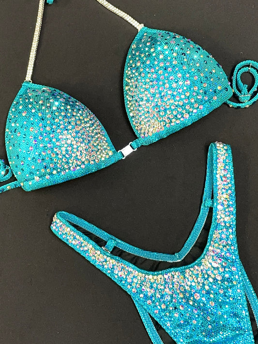 Turquoise/Teal Figure suit (TN589)