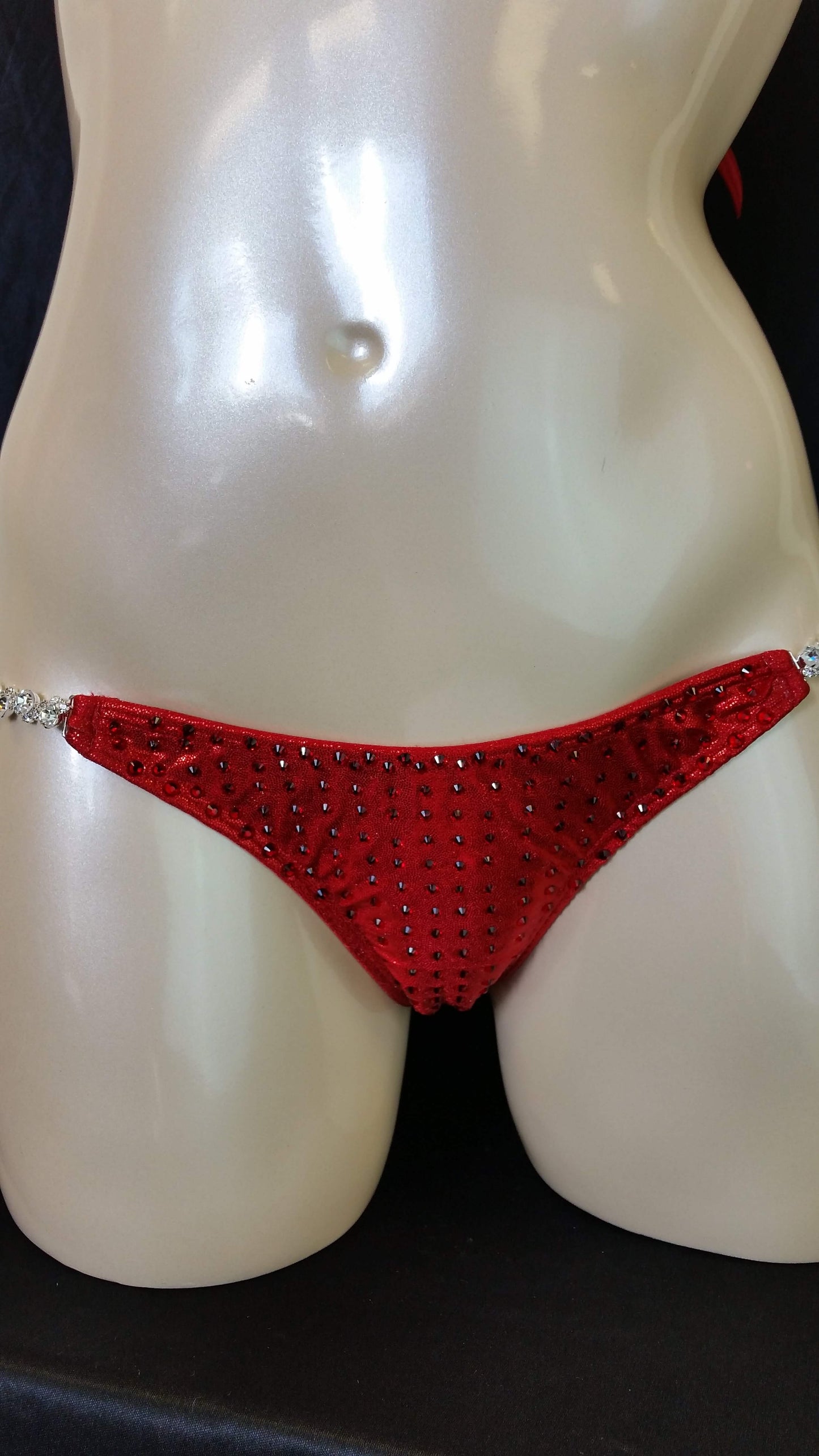 Red bikini with ruby colored rhinestones in a linear pattern design