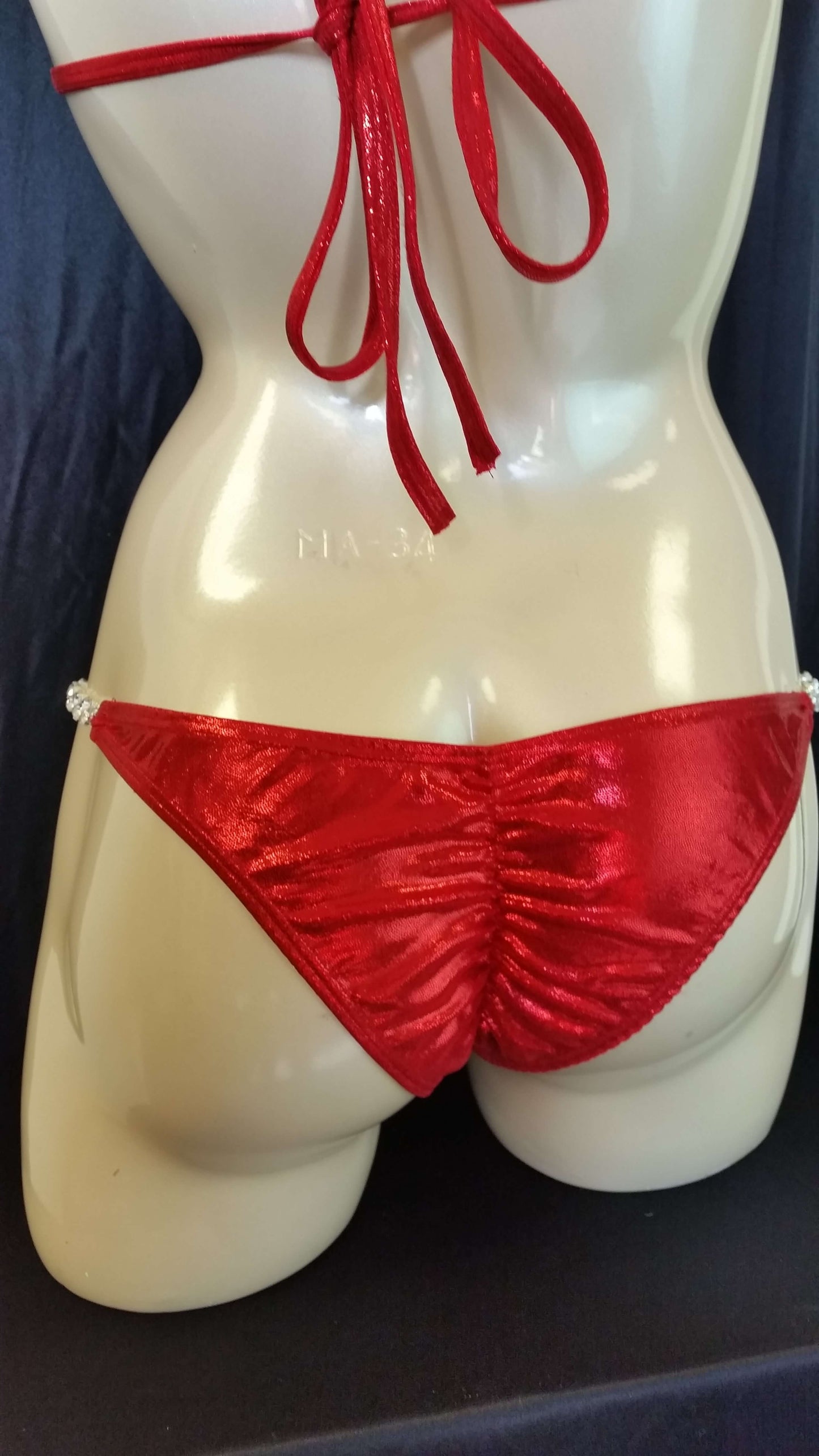 Red bikini with ruby colored rhinestones in a linear pattern design