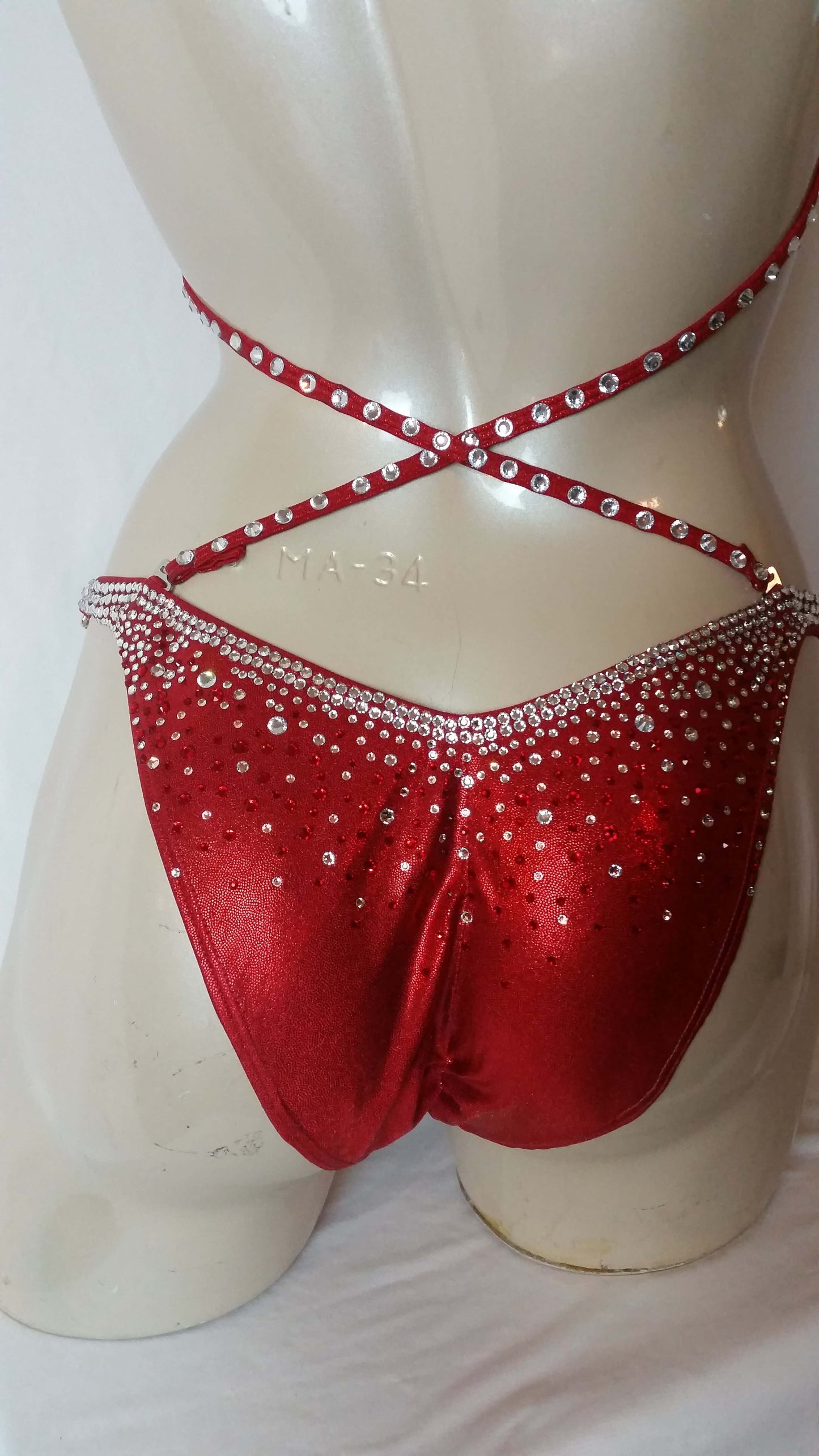 Crimson red bikini with multi sized crystal and ruby rhinestone design rhinestones.