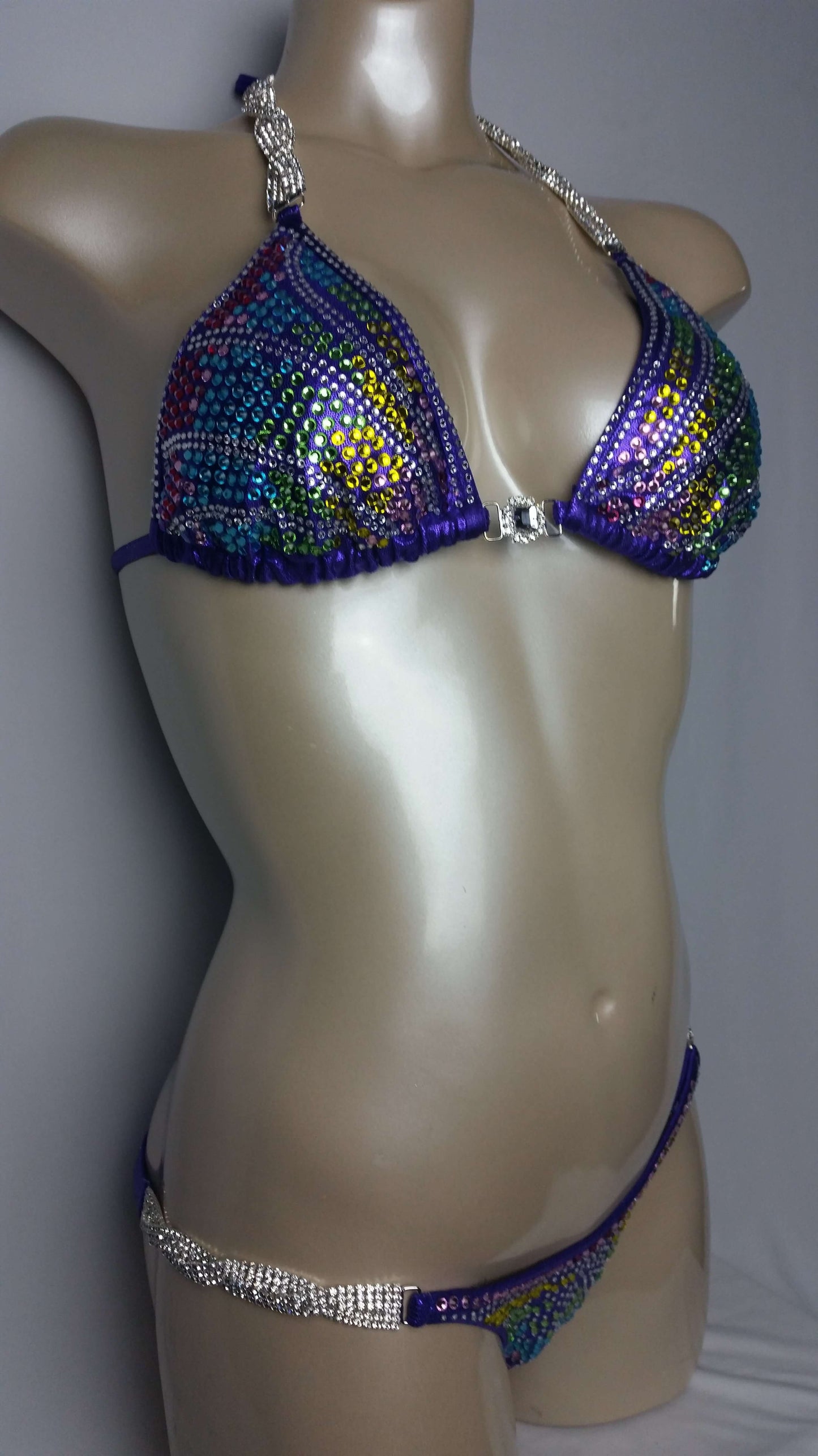 Purple bikini with rainbow butterfly wing rhinestone design