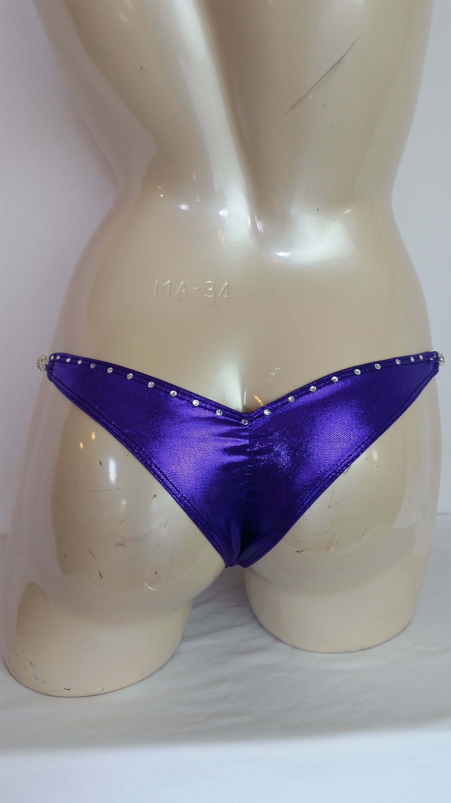 Purple bikini with crystal rhinestone in a linear pattern