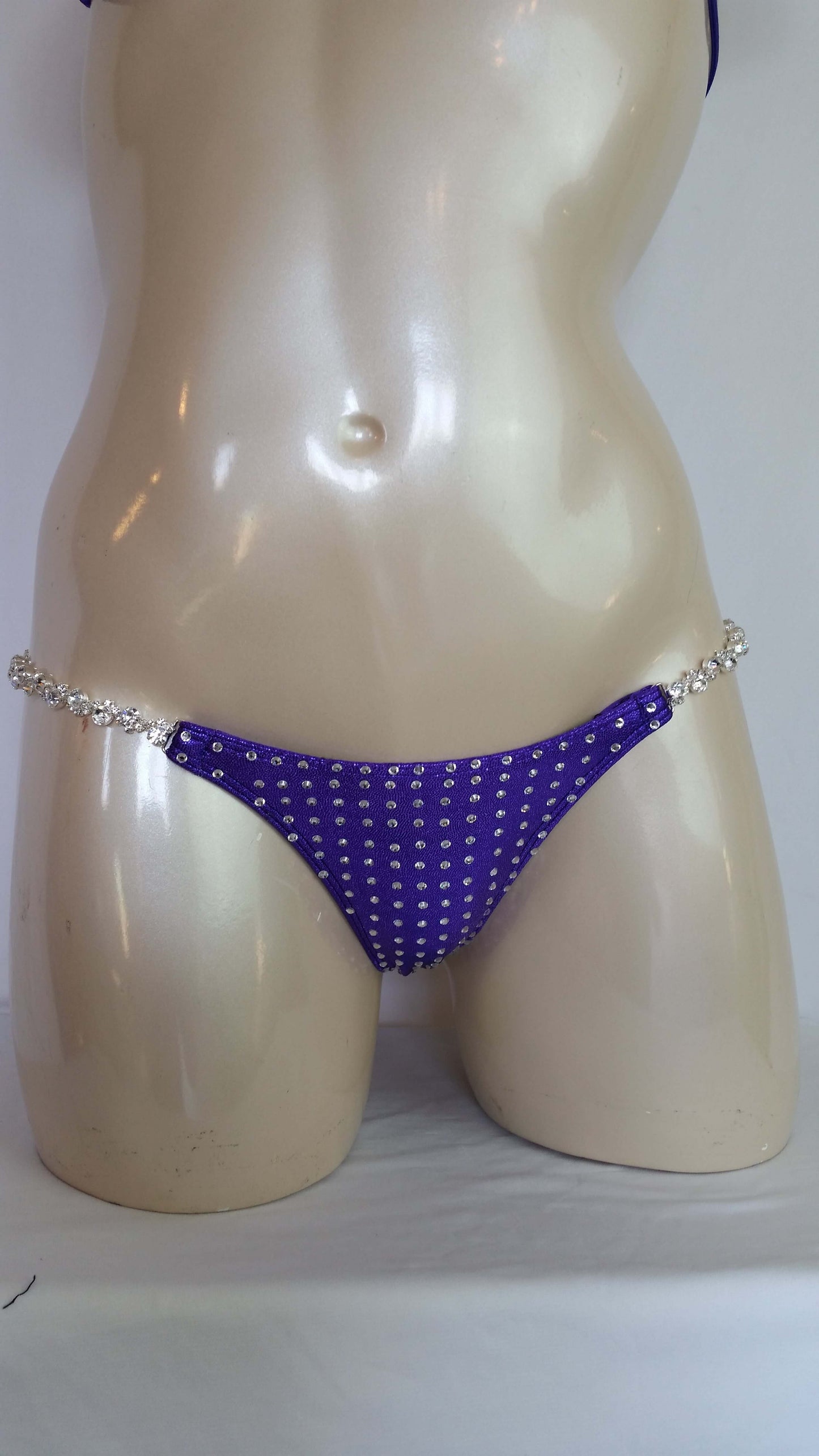 Purple bikini with crystal rhinestone in a linear pattern